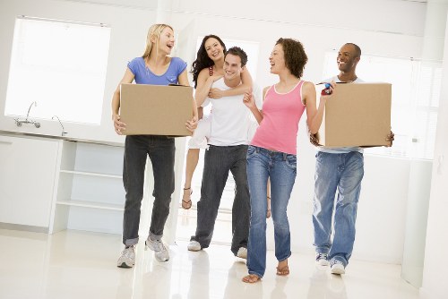 Professional movers packing a house