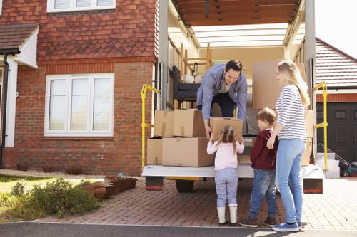 Removal team preparing a truck for loading at a property