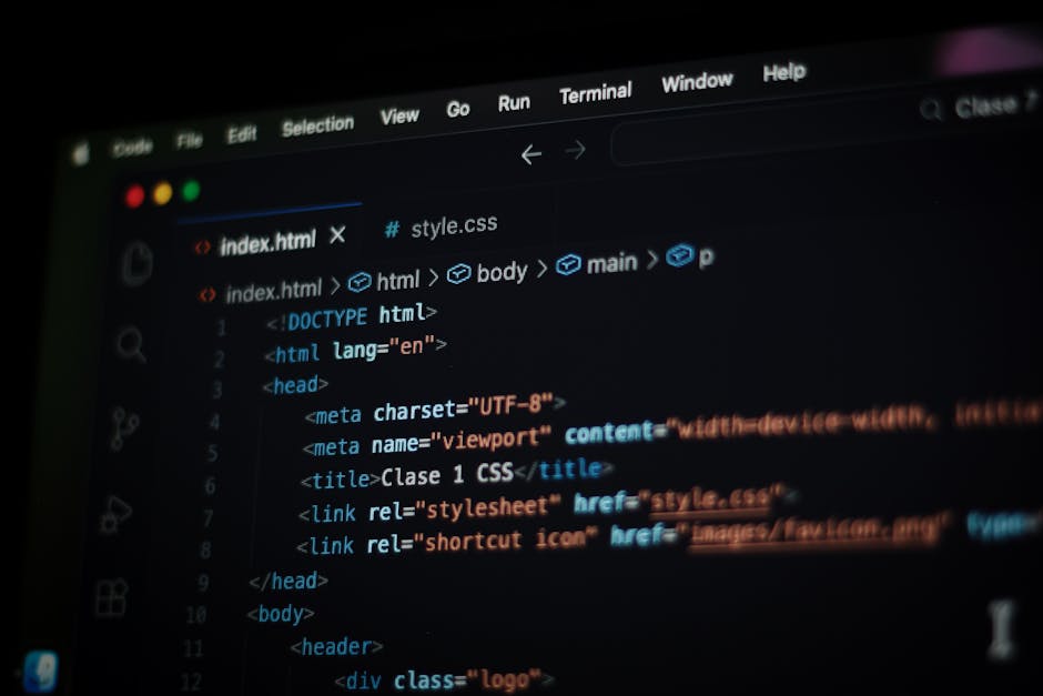 Close-up view of a computer screen displaying HTML code with visible tags such as <html>, <head>, <title>, and <body>. The code is part of a webpage titled 'Class 1 CSS,' with syntax highlighting in v